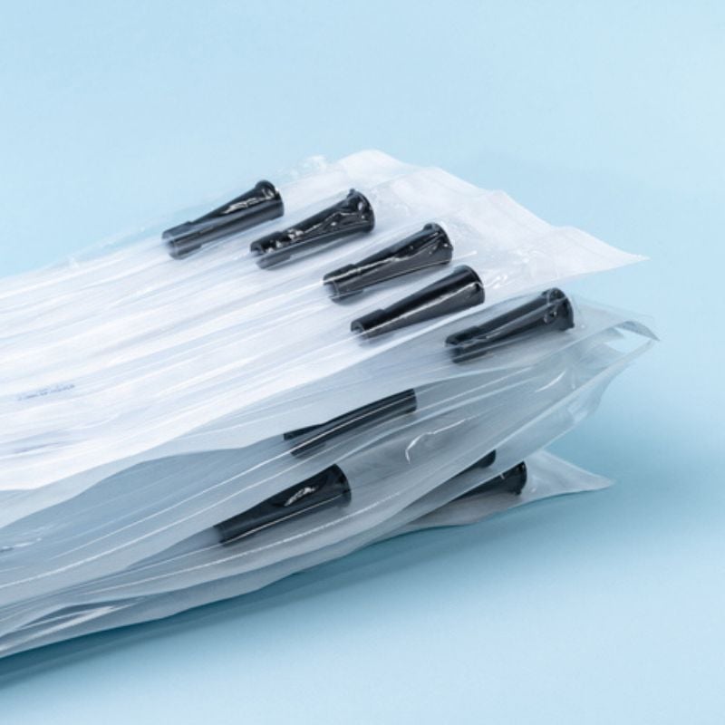Stack of unopened catheters. 
