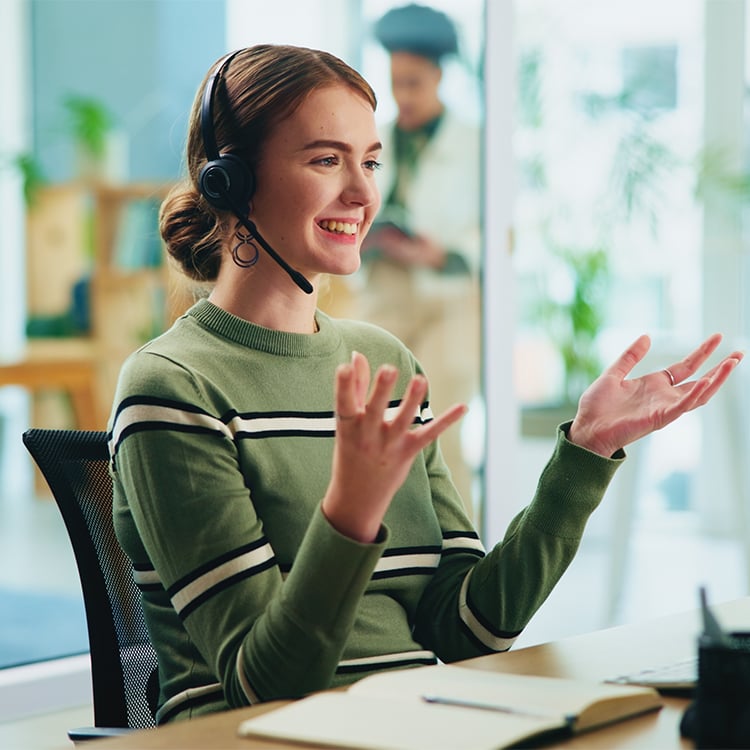 APA Medical call center specialist talking with patient on phone headset