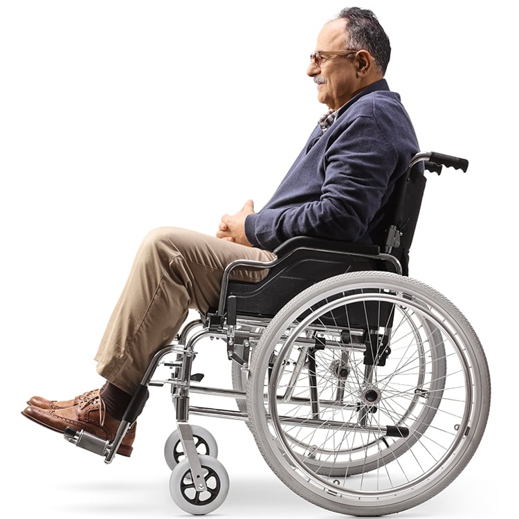 Man seated in wheelchair receiving support from APA Medical equipment services.